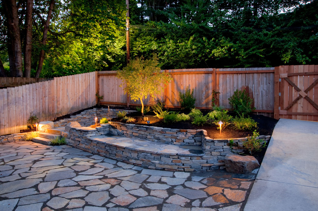 Landscape lighting installation with pathway lights and accent fixtures by B-Line Electric LLC